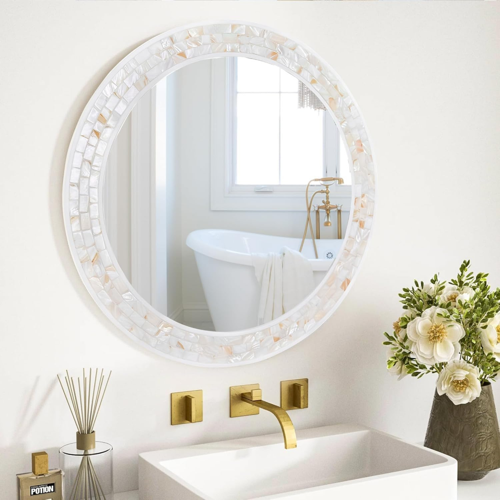 Modern round wall mirror with decorative shell frame and clear glass, white bathroom and vanity mirror for contemporary interiors