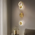 Modern geometric LED wall sconce with acrylic shade, luxury black and gold wall light for bedroom and contemporary interior lighting