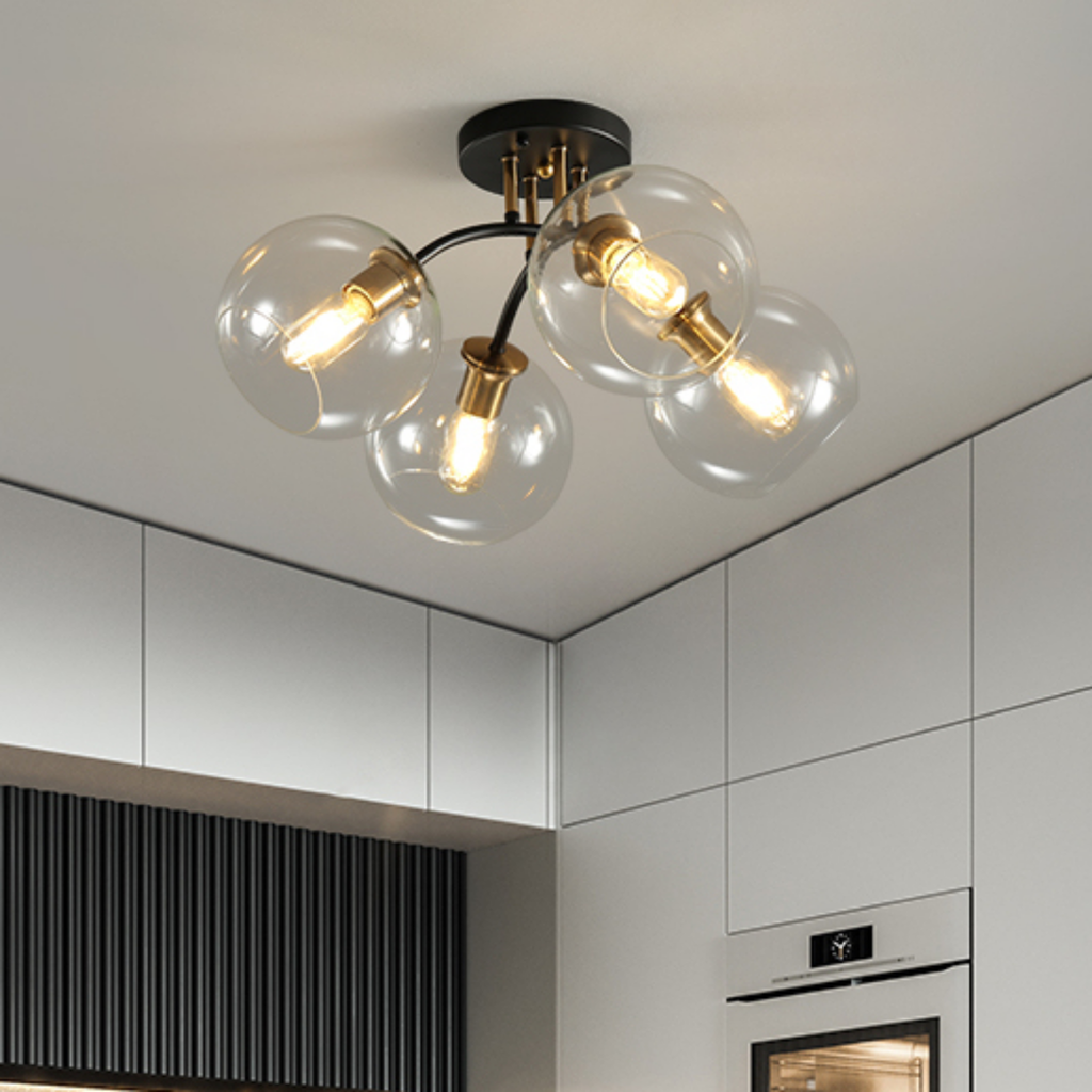4-light clear glass ceiling fixture with round shades