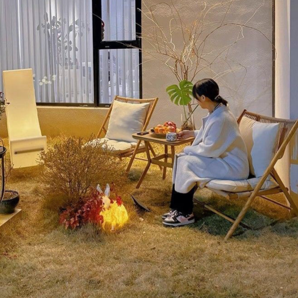 Modern Chinese style outdoor patio table and chair set with PE rattan, tempered glass table, carbon steel frame, two folding chairs, removable cushions, garden balcony and terrace furniture