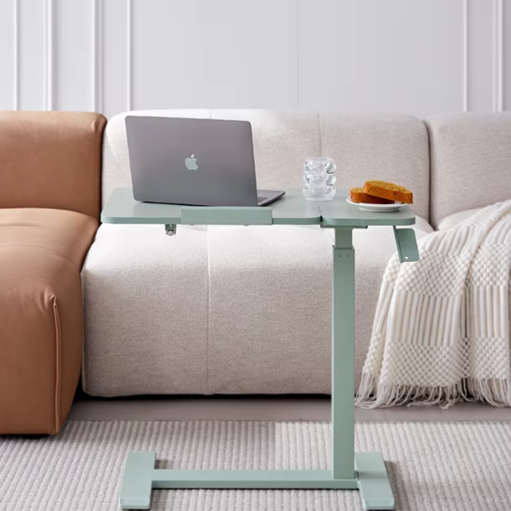 Adjustable rolling computer desk in a home office
