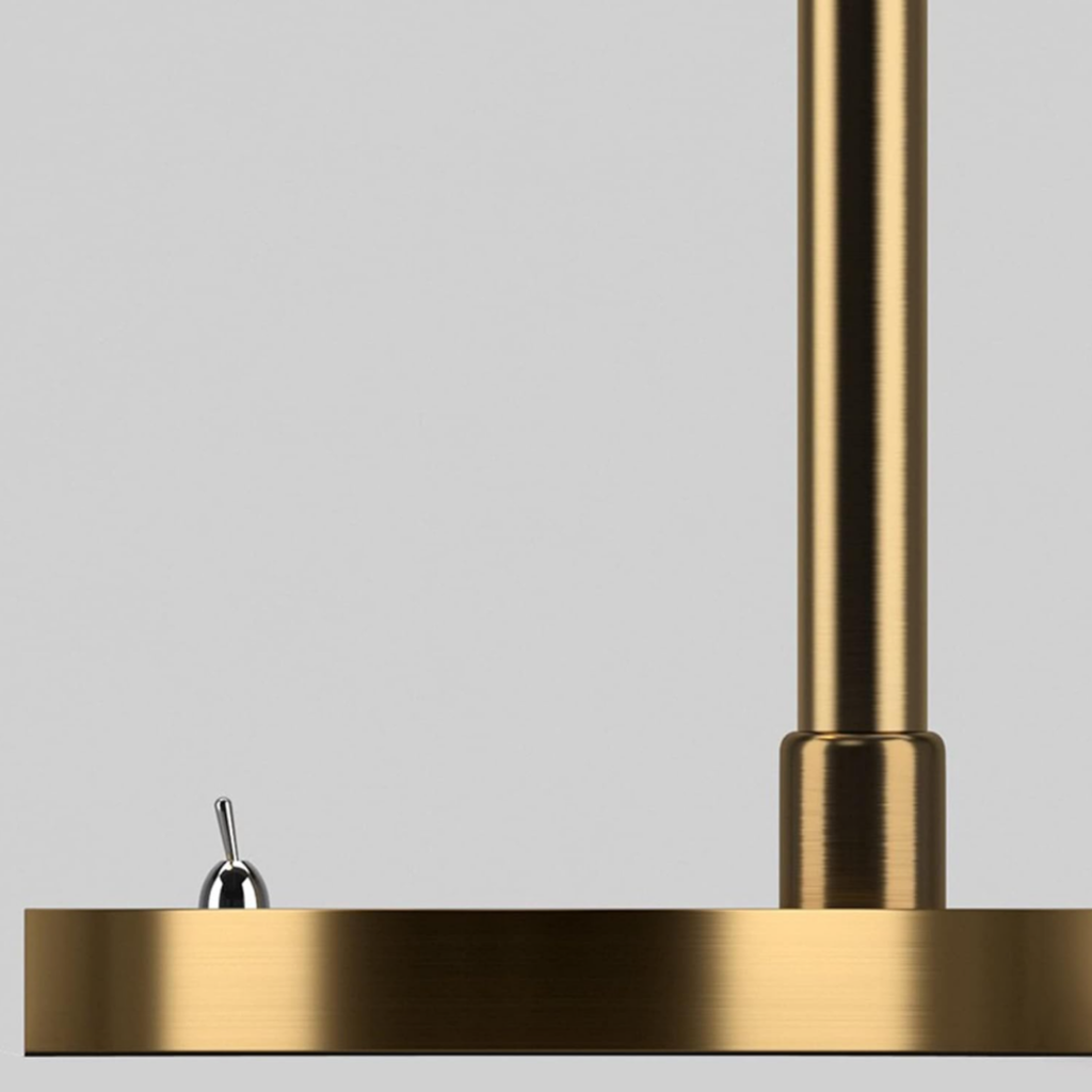 Close-up of the base of the adjustable iron desk lamp