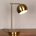 Adjustable iron desk lamp turned on