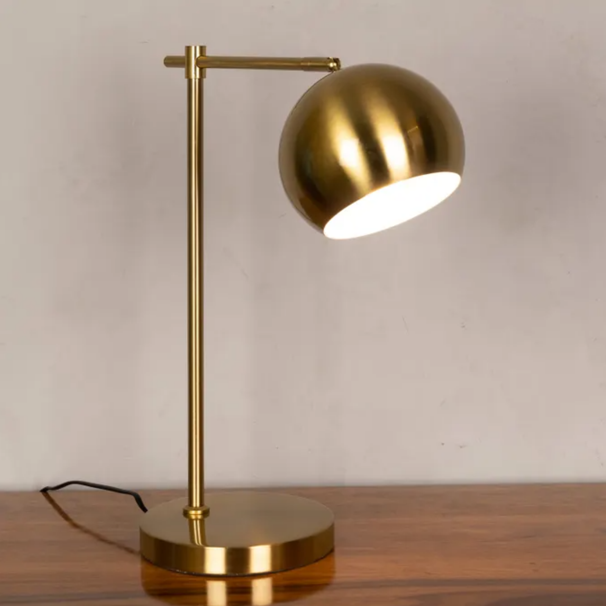 Adjustable iron desk lamp turned on
