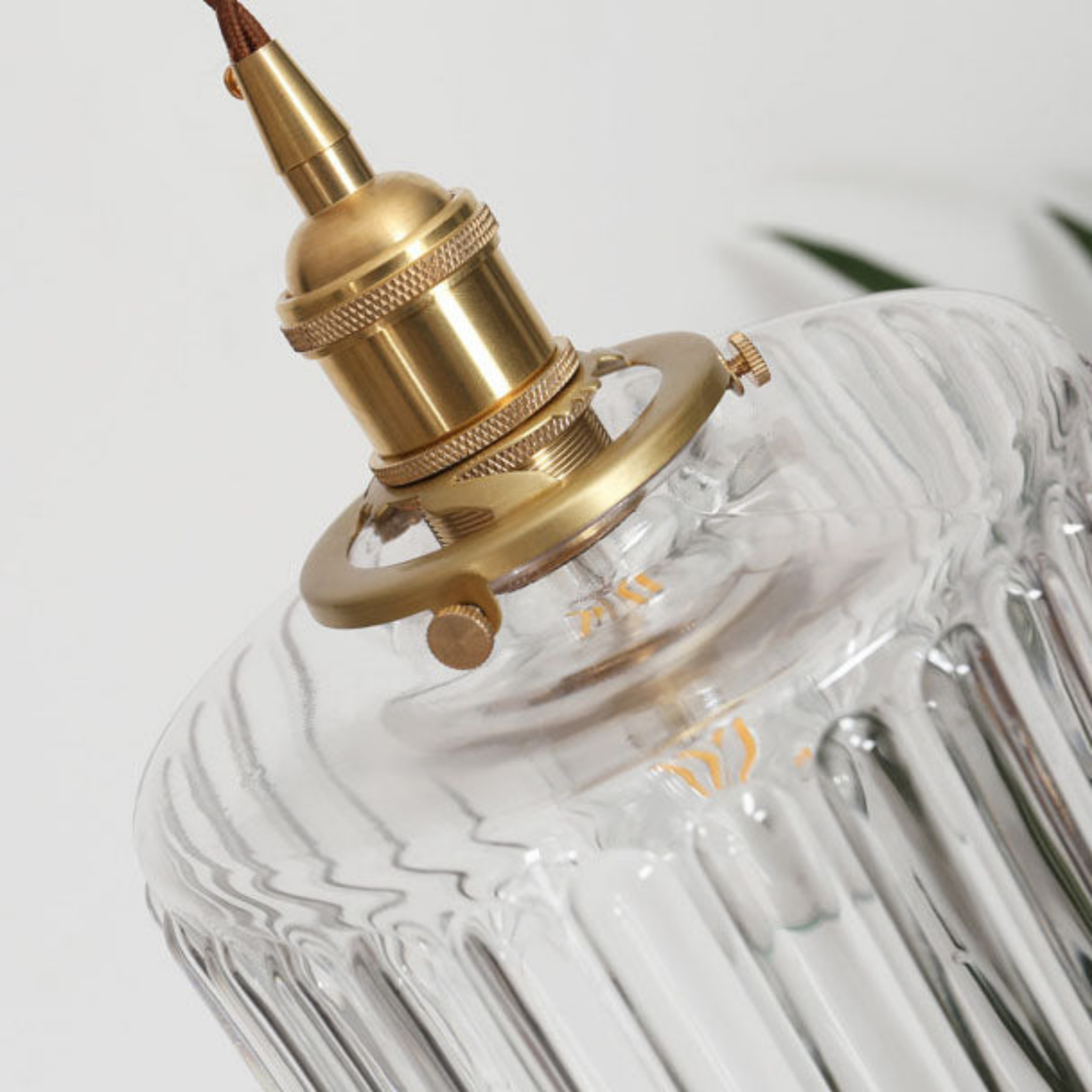 Brass and glass detail of Japanese pendant light