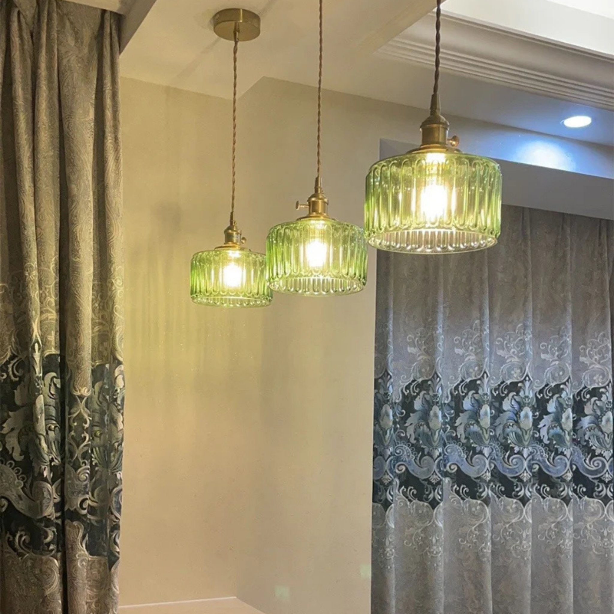 Brass glass pendant light in a modern interior