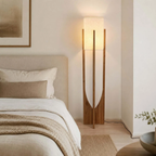 Chinese-inspired wooden floor lamp in a bedroom