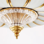 Modern copper flush mount ceiling light  close-up from an angle