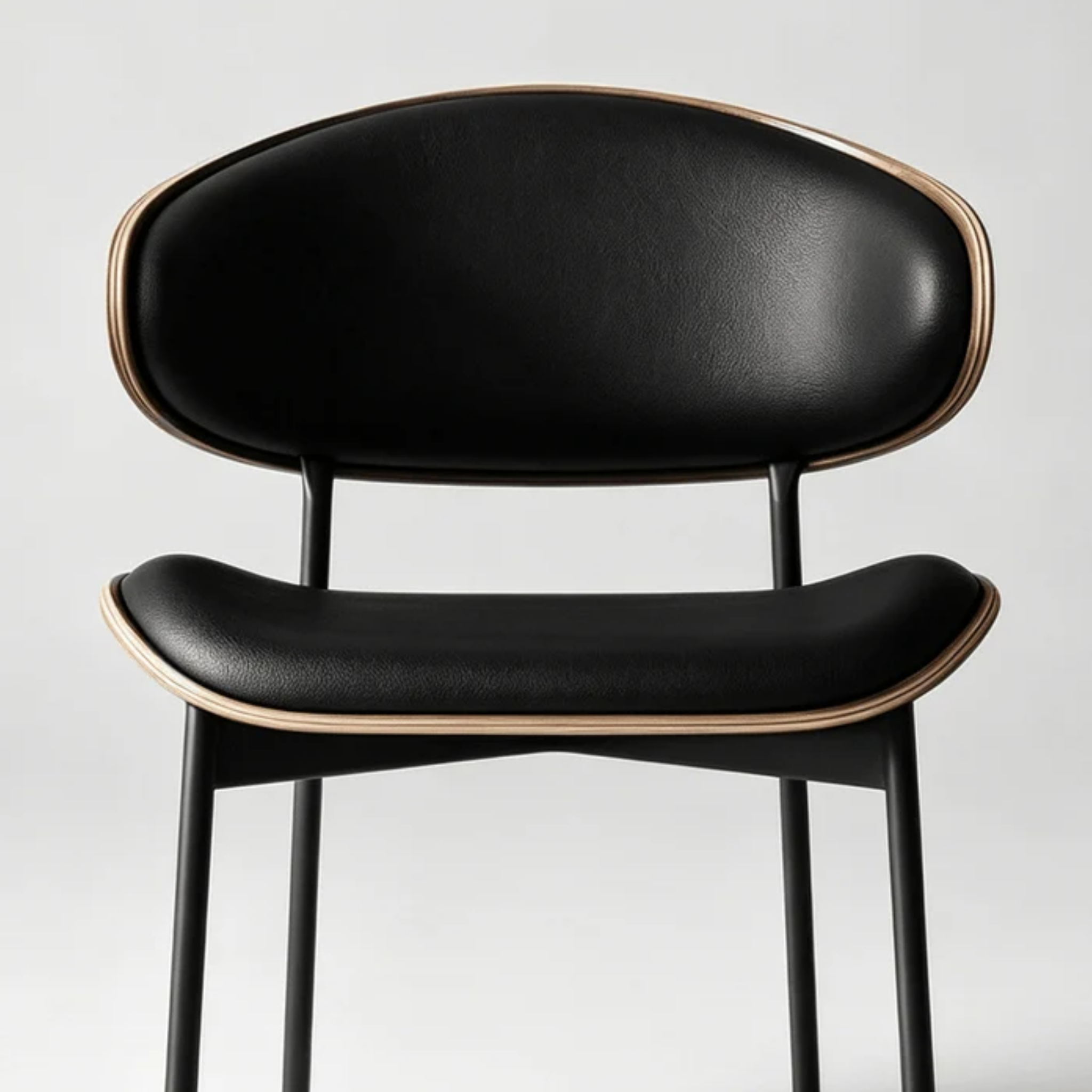 Front view of modern curved back dining chair