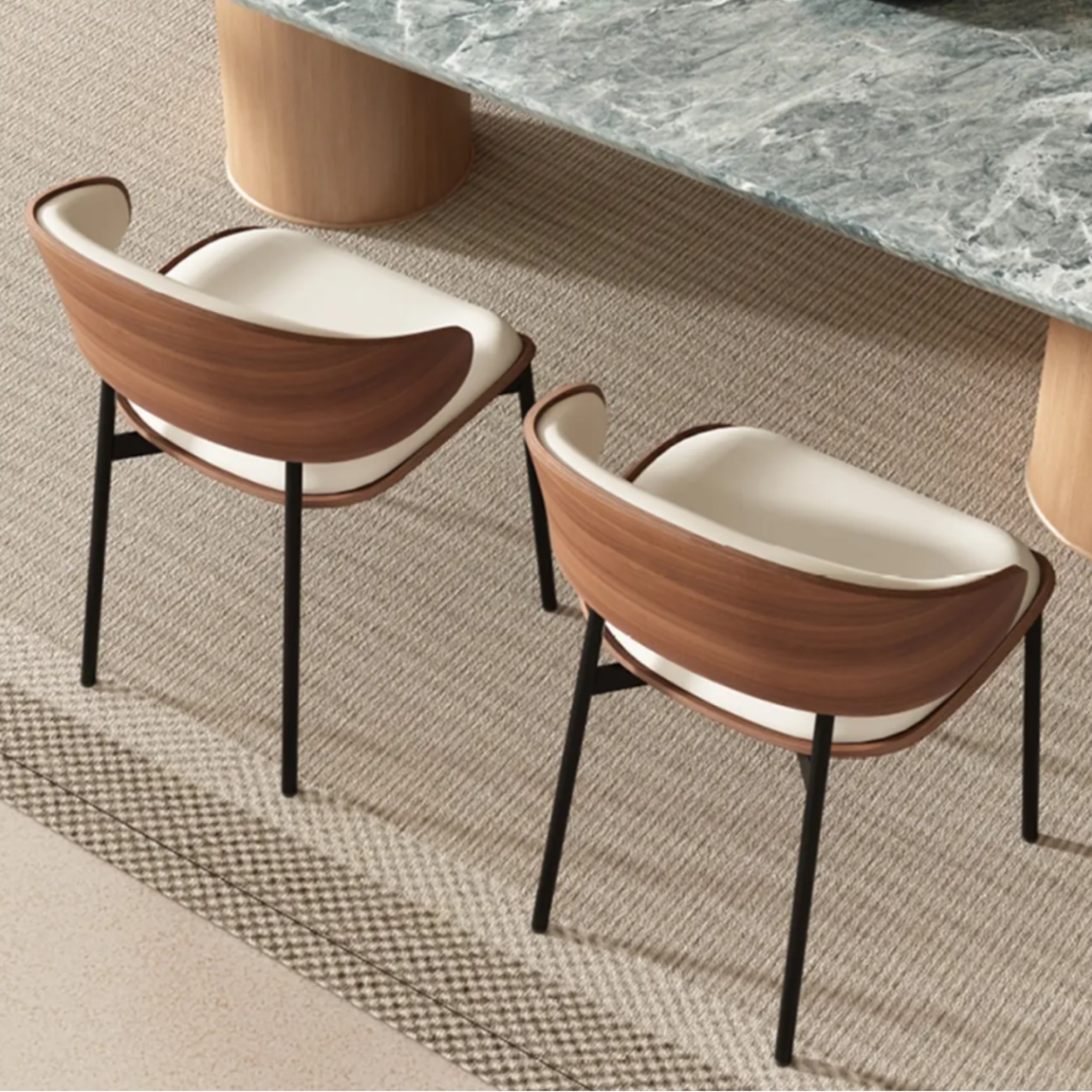 Curved back dining chairs in a modern interior