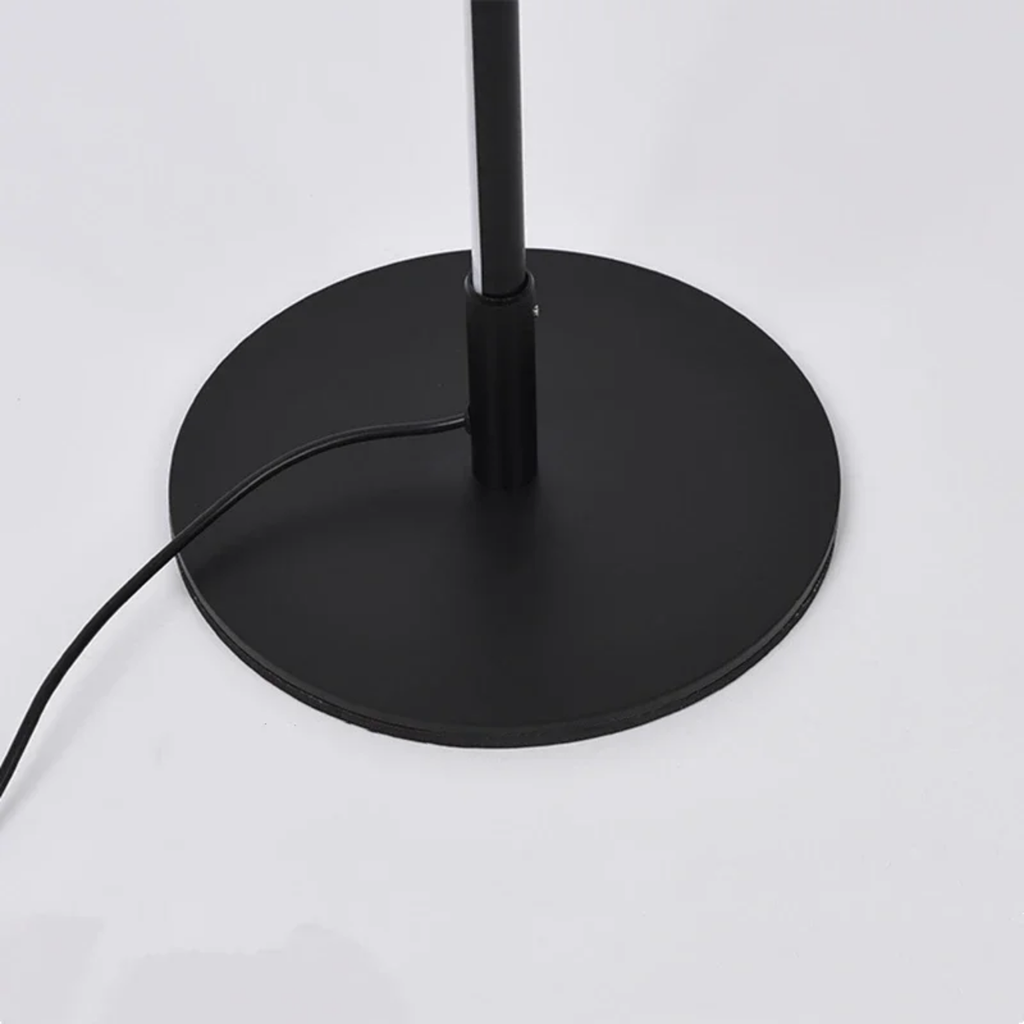 Base detail of modern curved LED floor lamp