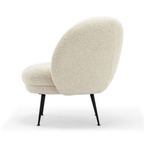 Side view of curved upholstered sherpa lounge chair