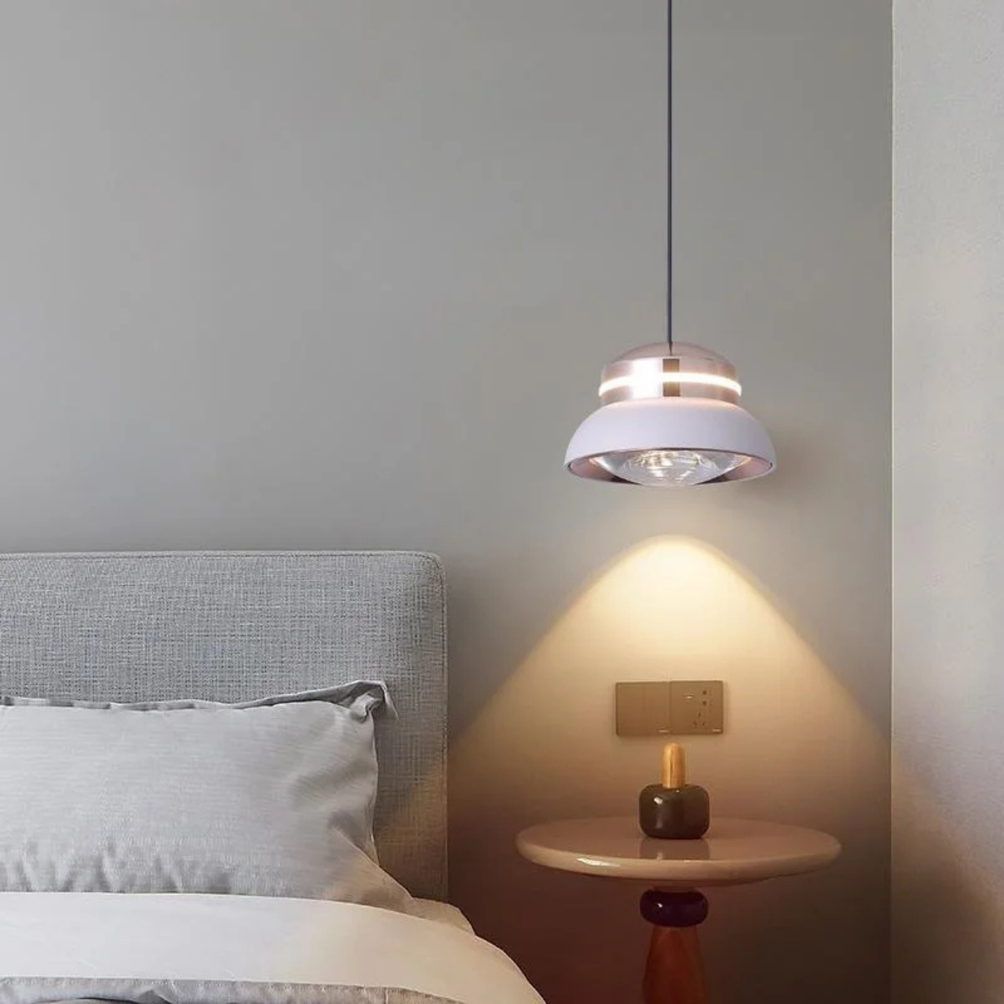 Modern dome LED pendant light in a bedroom