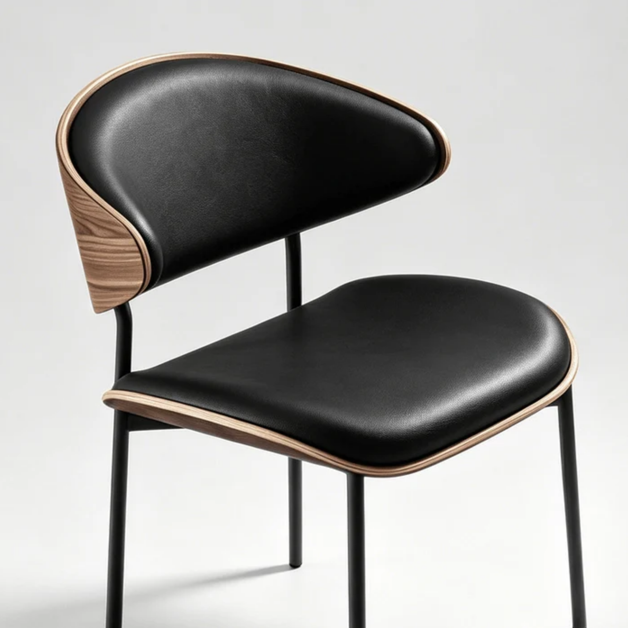 Close-up of faux leather upholstery on modern dining chair
