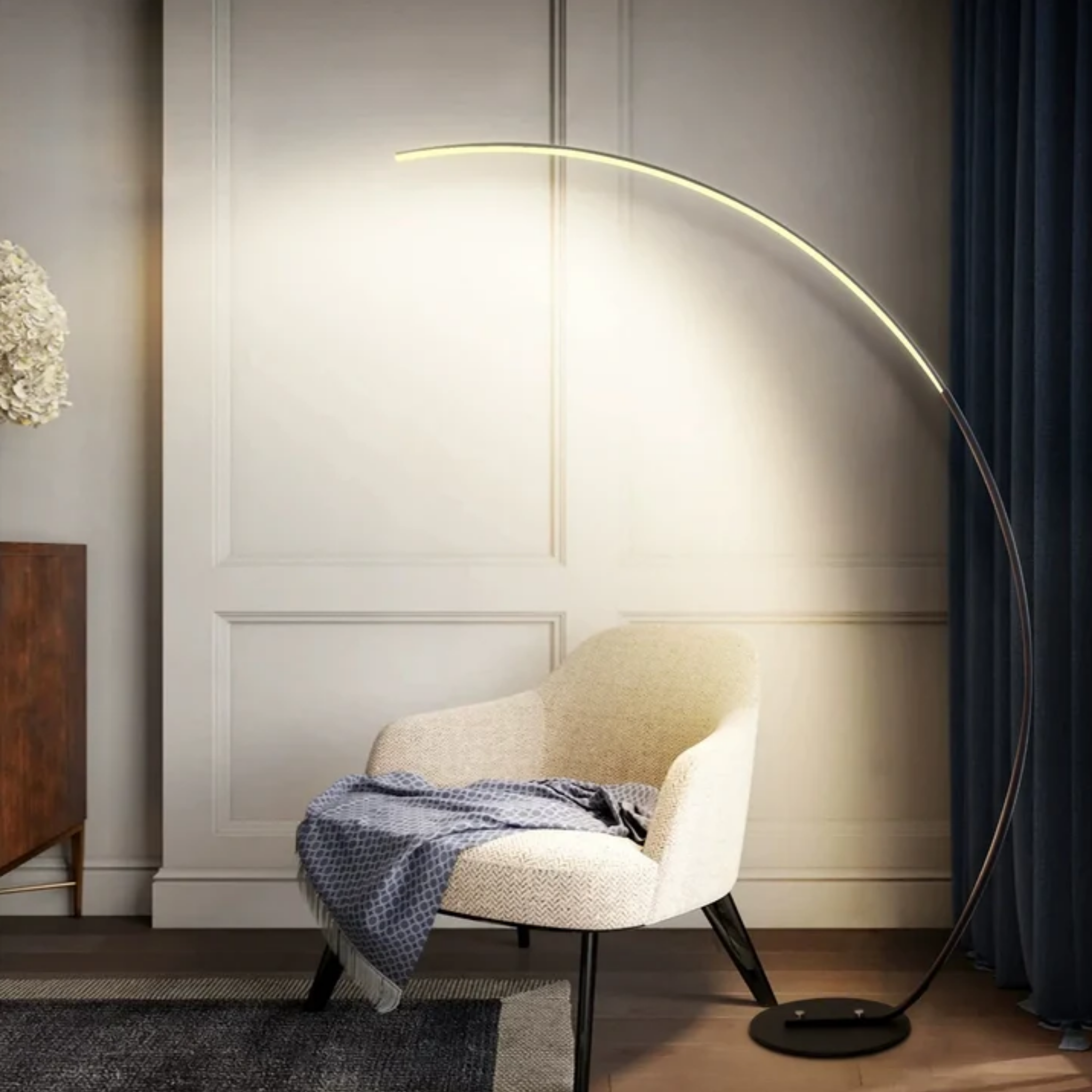 Modern fishing rod floor lamp beside a lounge chair