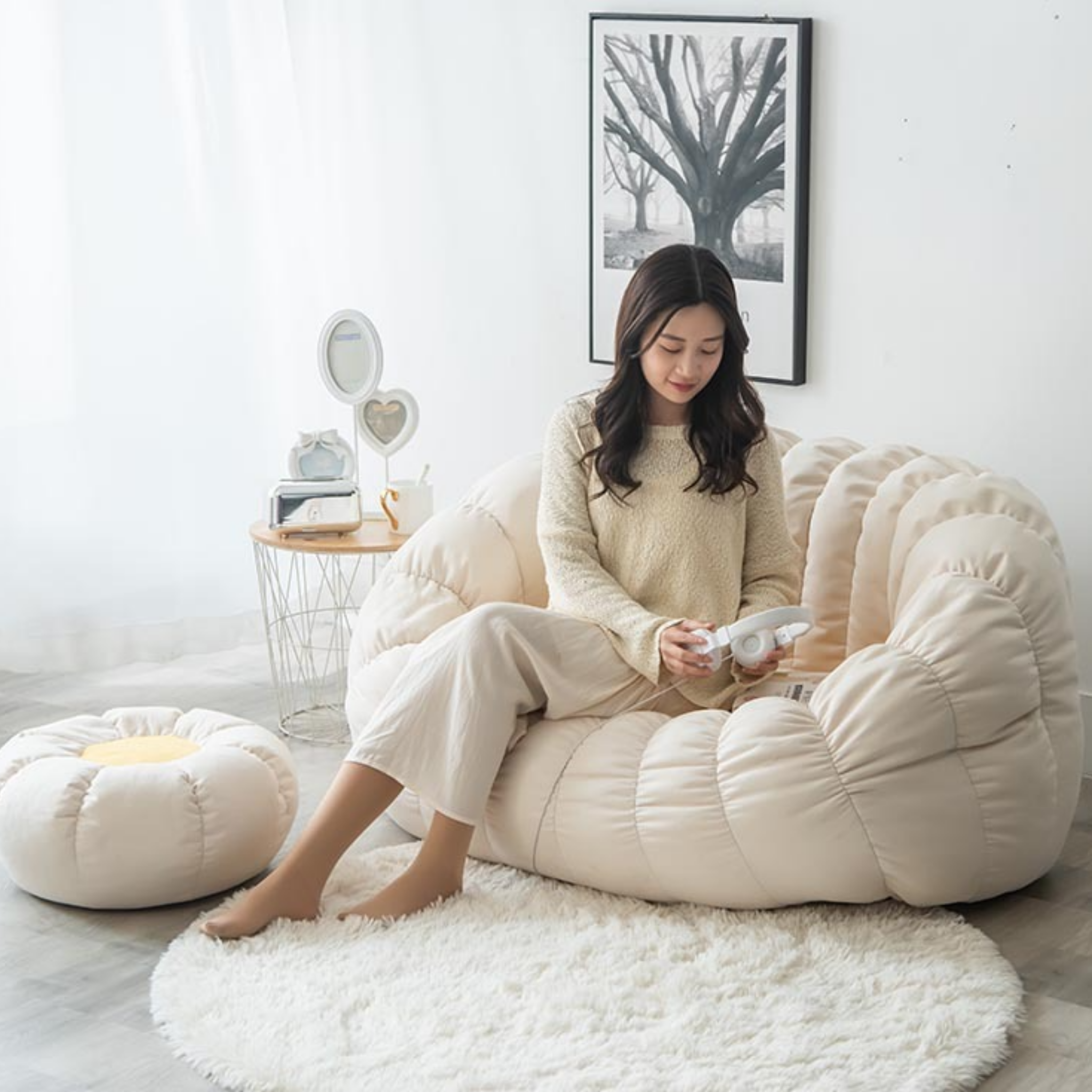 Woman sitting on a flower-shaped bean bag chair