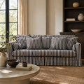 French striped 3-seater sofa in a living room