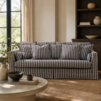 French striped 3-seater sofa in a living room