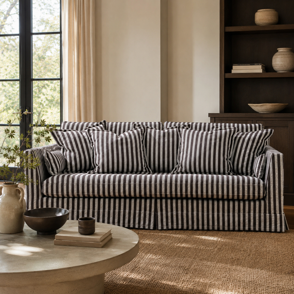 French striped 3-seater sofa in a living room