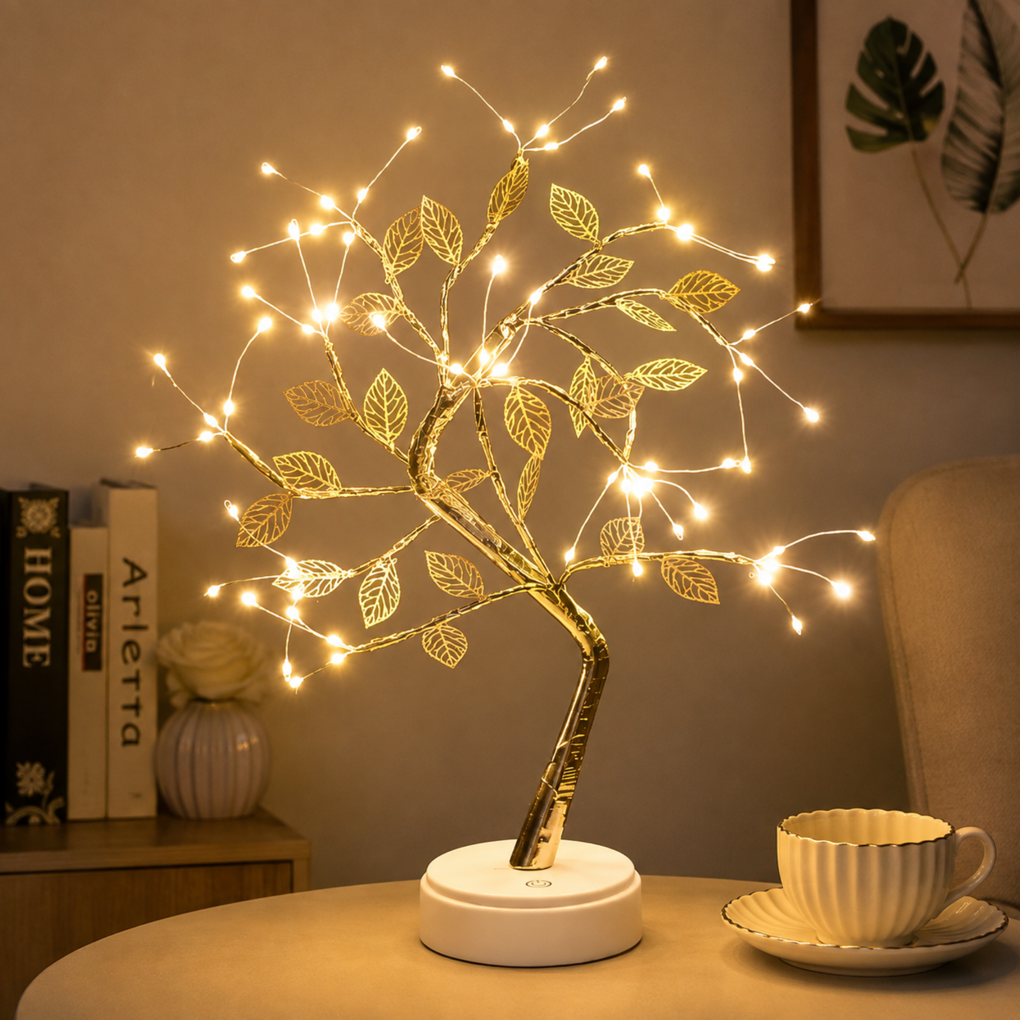 Golden leaf tree table lamp turned on