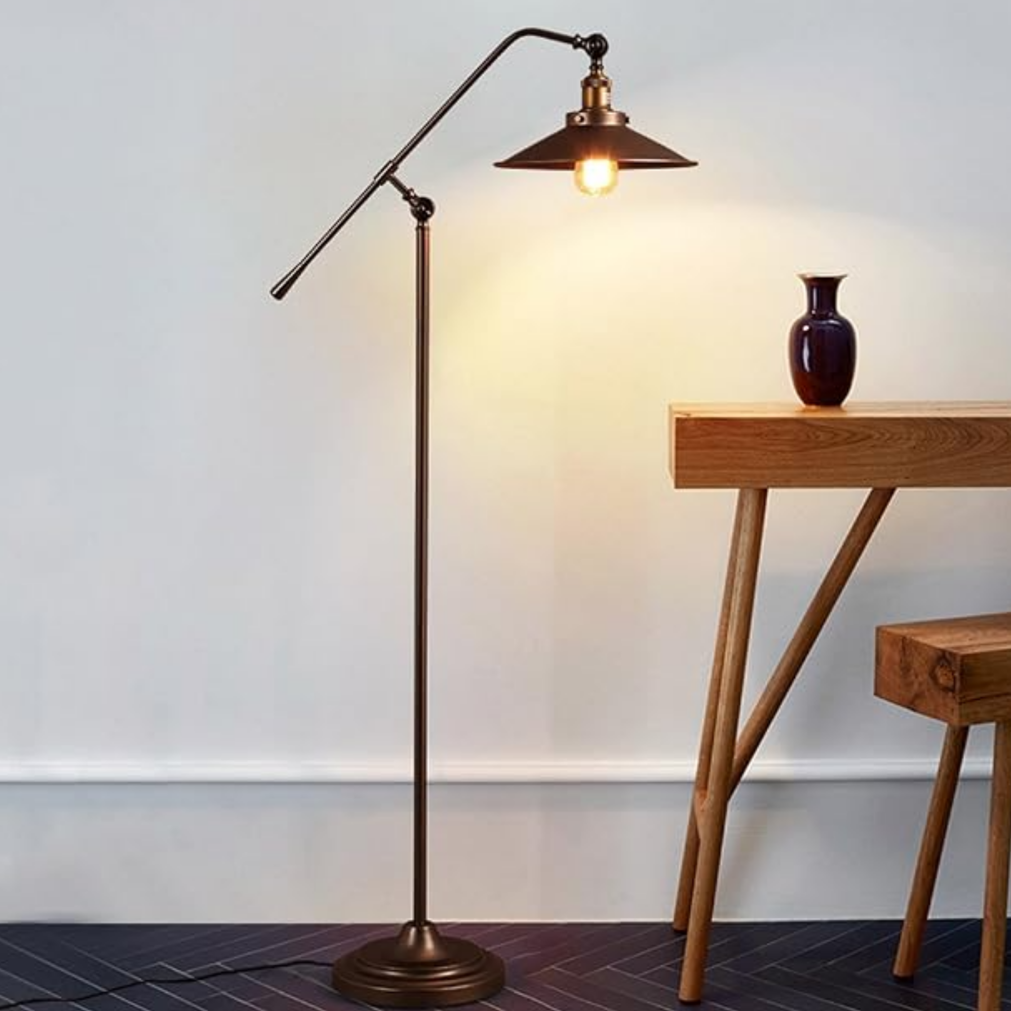 Industrial adjustable reading floor lamp in a reading corner