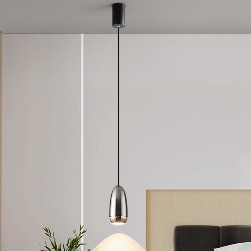 Industrial aluminum bullet LED pendant ceiling light in a bedroom