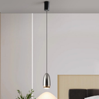 Industrial aluminum bullet LED pendant ceiling light in a bedroom