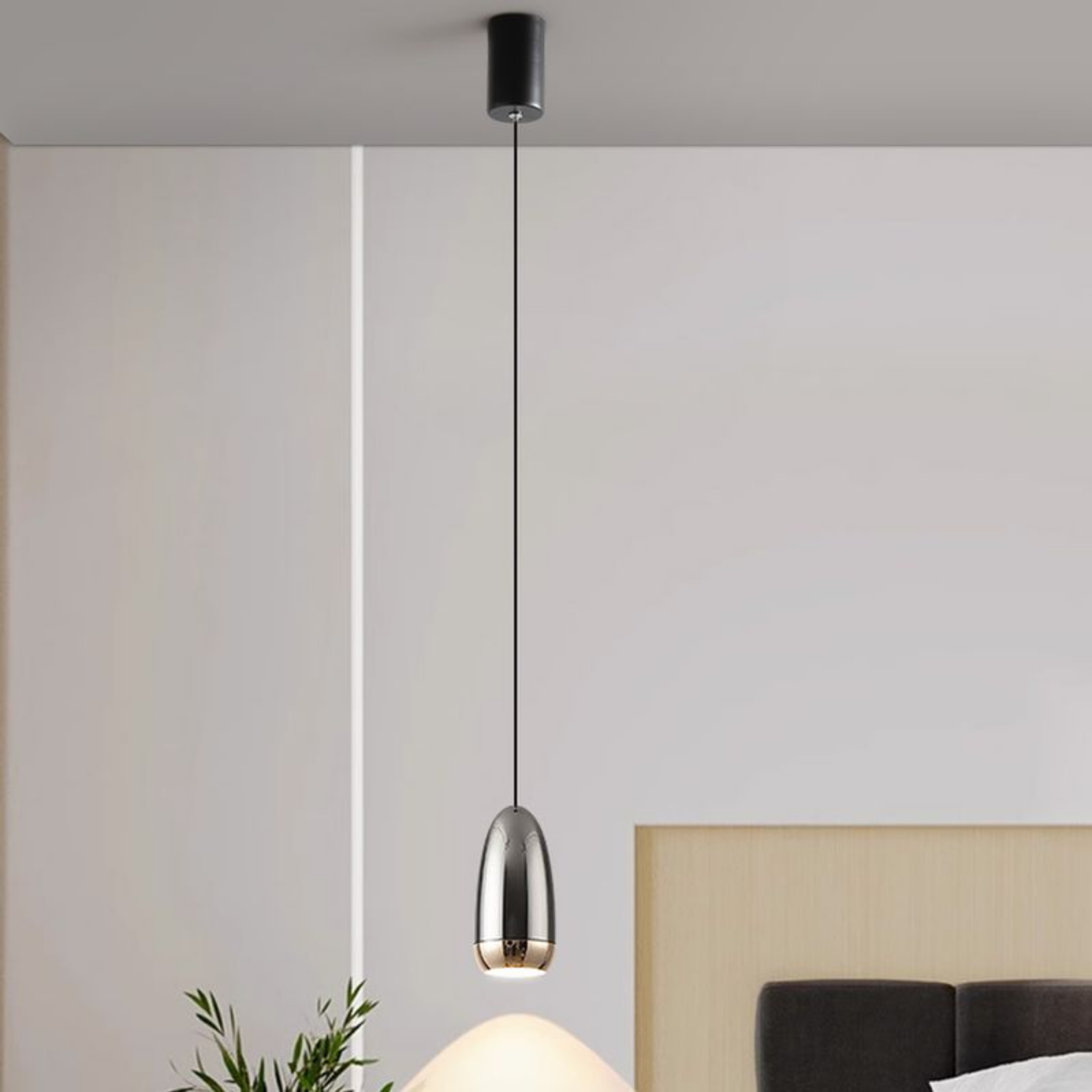 Industrial aluminum bullet LED pendant ceiling light in a bedroom