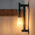 Angled view of the vintage industrial wall sconce