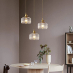 Japanese pendant light above a dining area