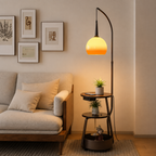 Floor lamp with built-in side table beside a sofa in a living room