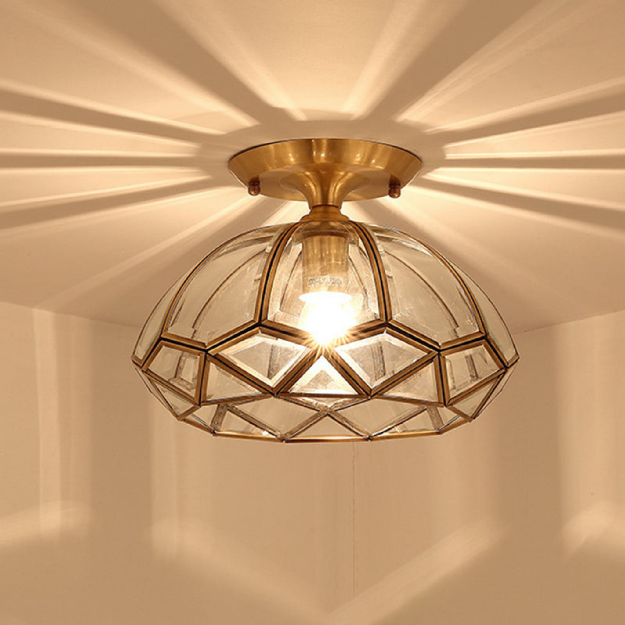 Luxury all copper round glass ceiling light turned on