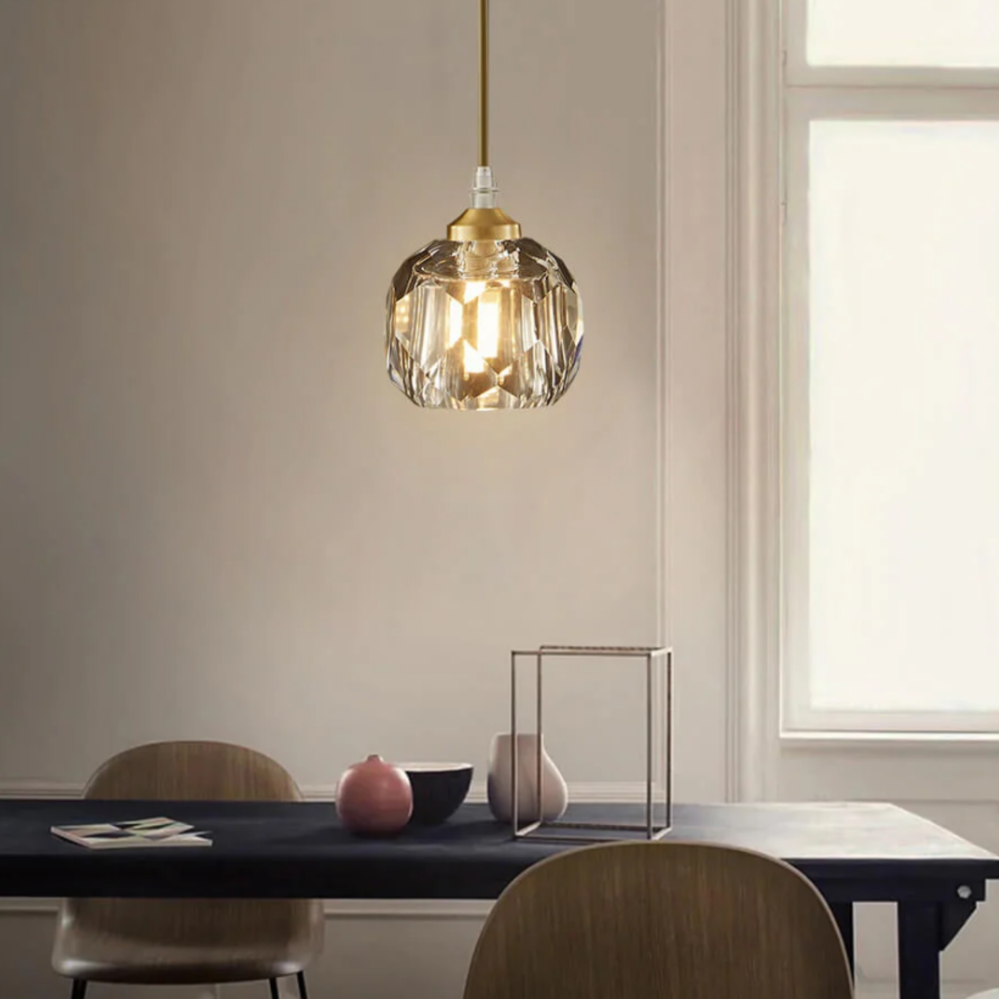 Luxury crystal globe pendant ceiling light above a kitchen island