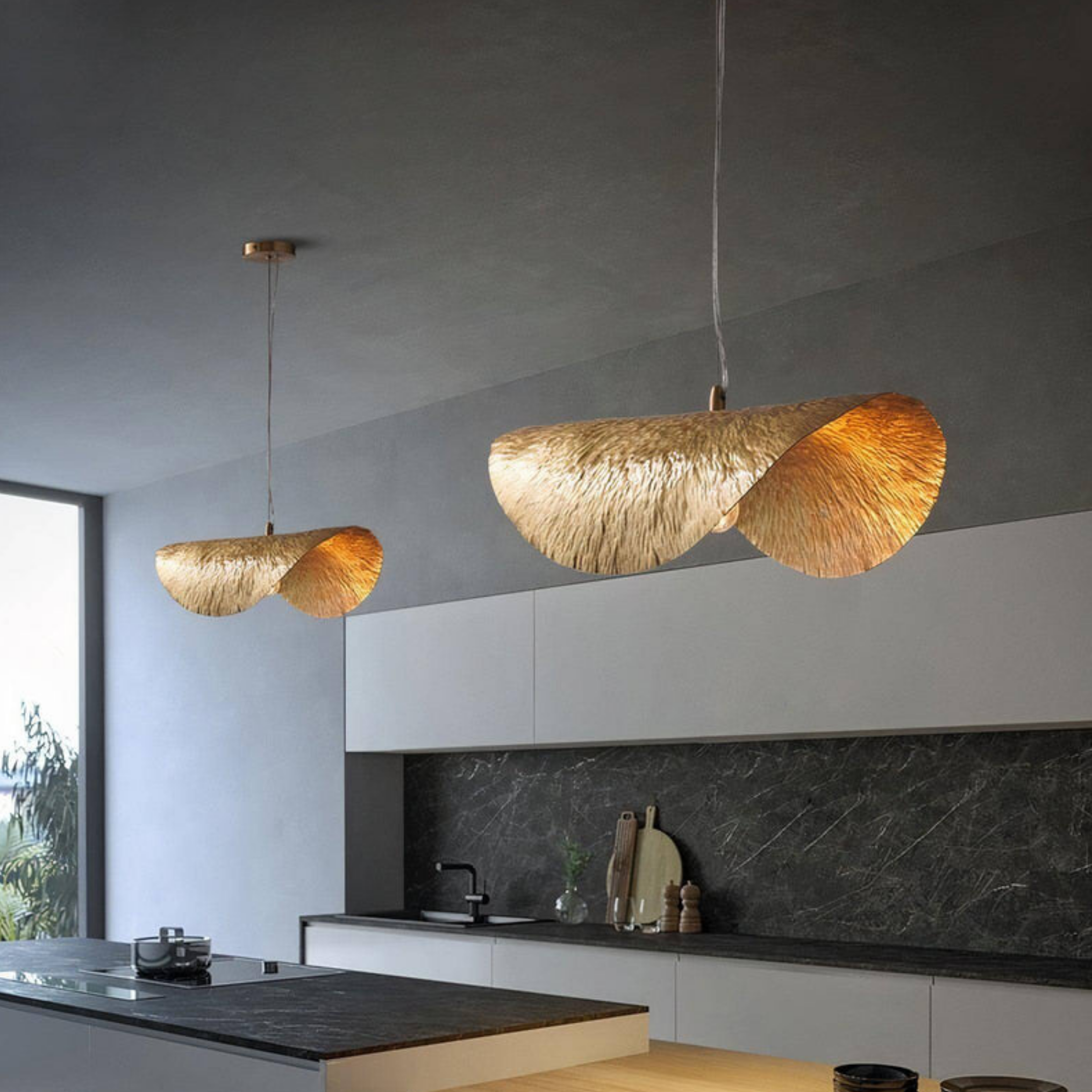 Luxury gold lotus leaf pendant ceiling light above a kitchen island