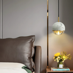 White luxury marble globe pendant ceiling light in a bedroom