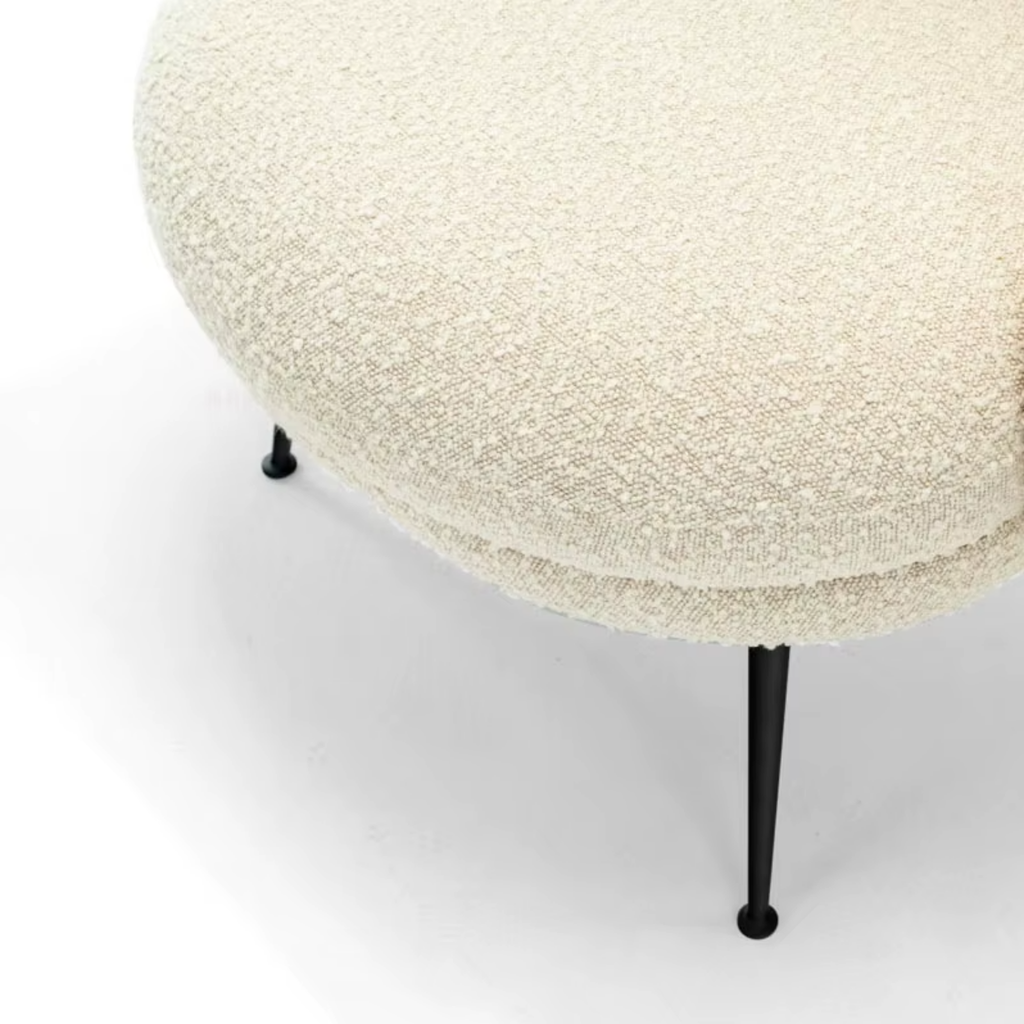 Metal frame detail of modern sherpa accent chair