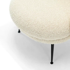 Metal frame detail of modern sherpa accent chair
