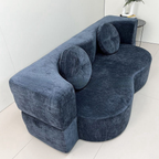 Side view of the modern chenille sofa bed