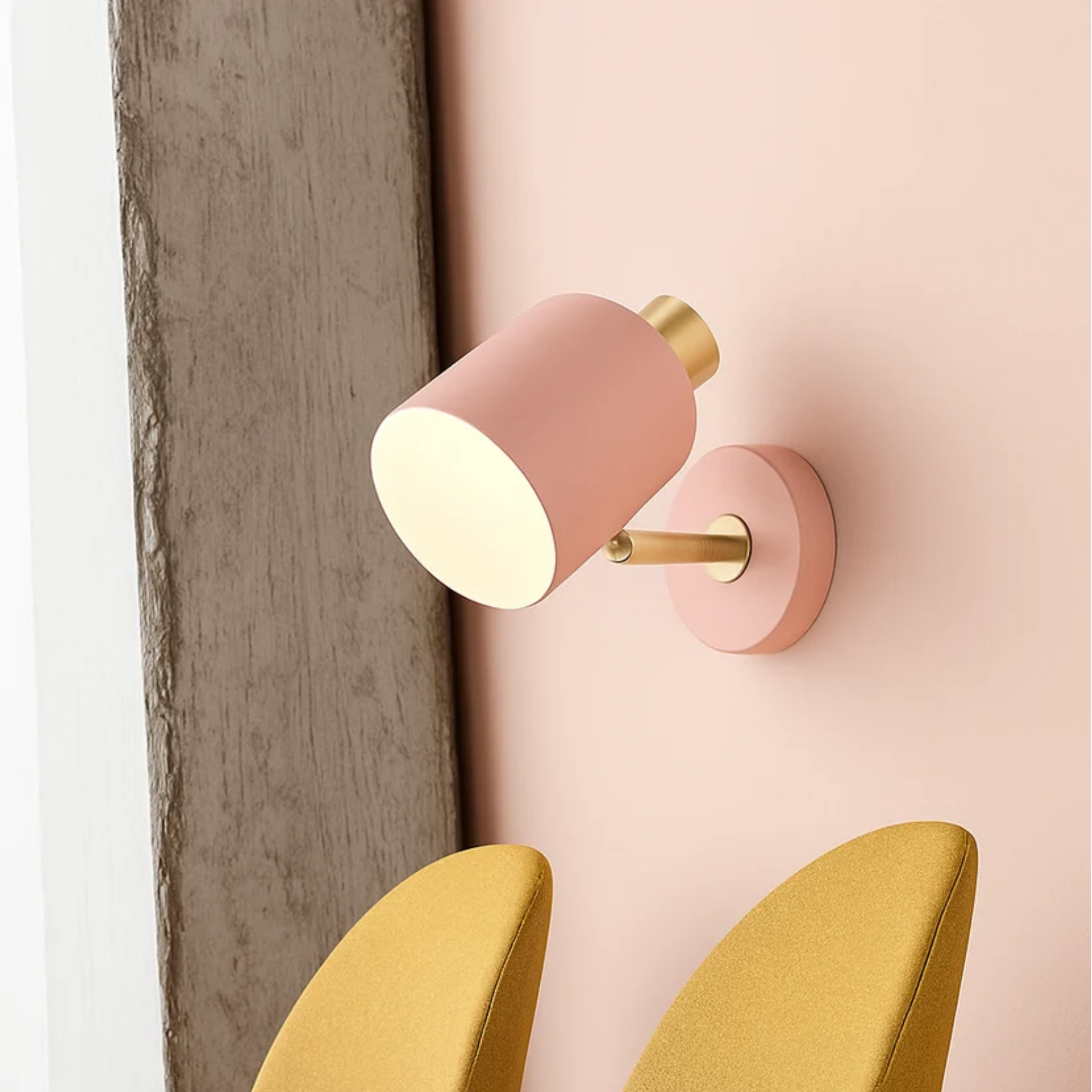 Angled view of the colorful cylinder wall sconce