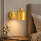 Modern colorful cylinder wall sconce in a bedroom