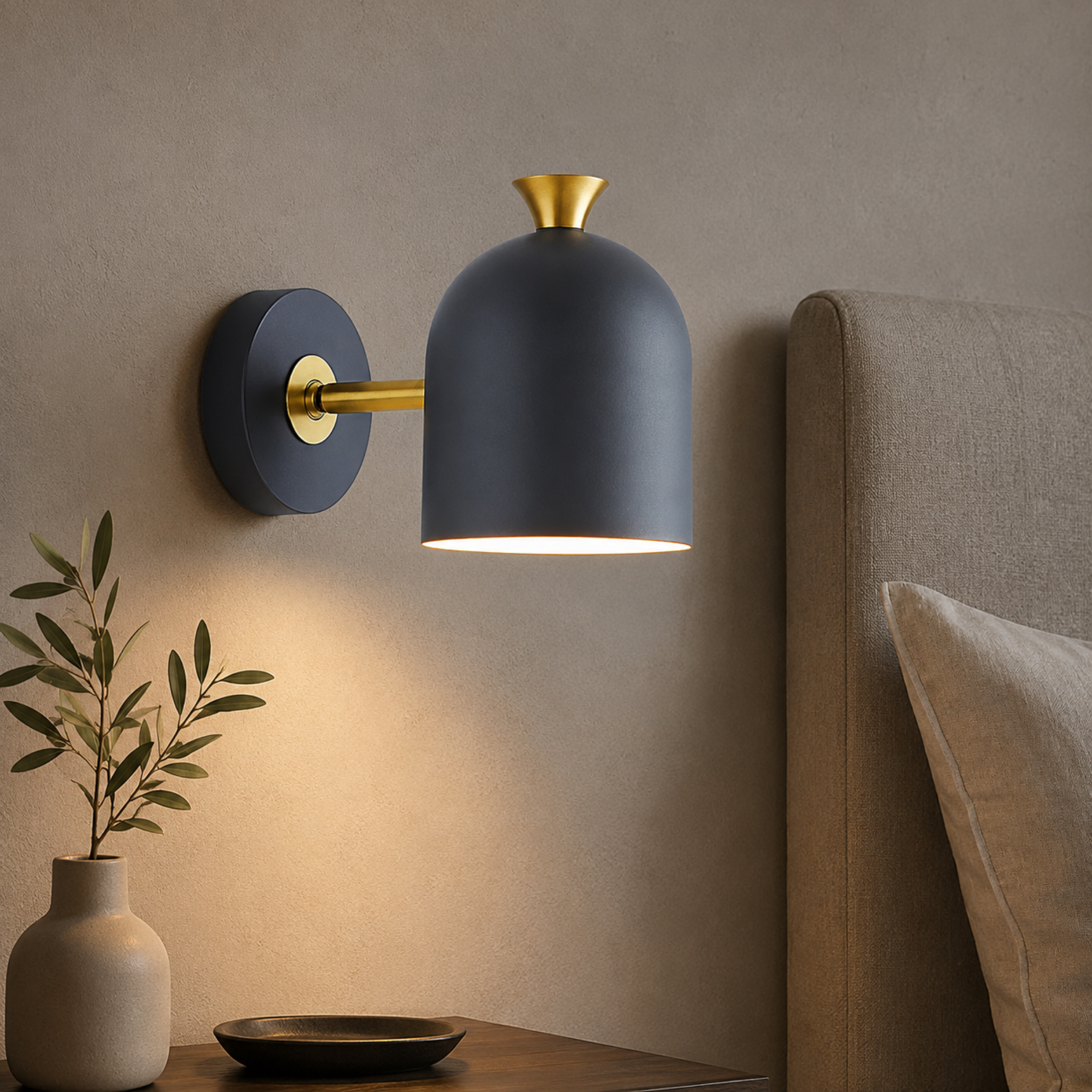 Colorful cylinder wall light beside a bed
