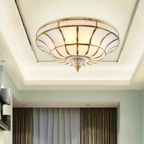 Modern copper flush mount ceiling light in a living room