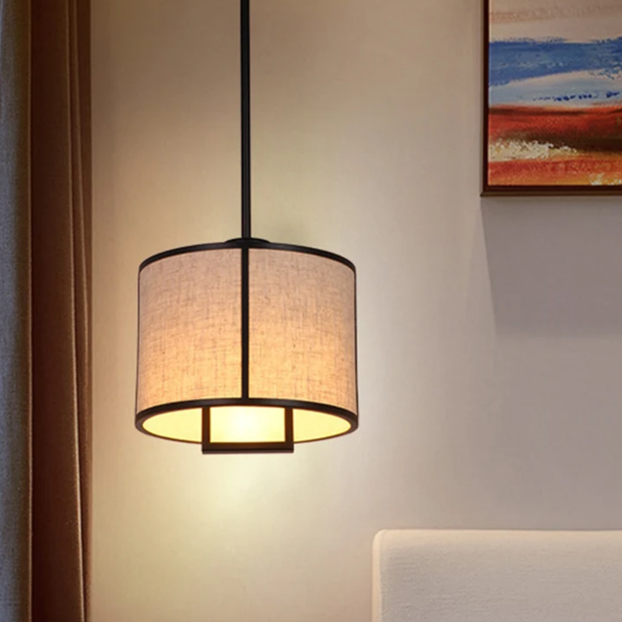 Modern fabric drum pendant ceiling light in a bedroom