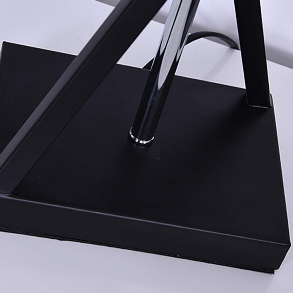 Close-up of the iron lamp base