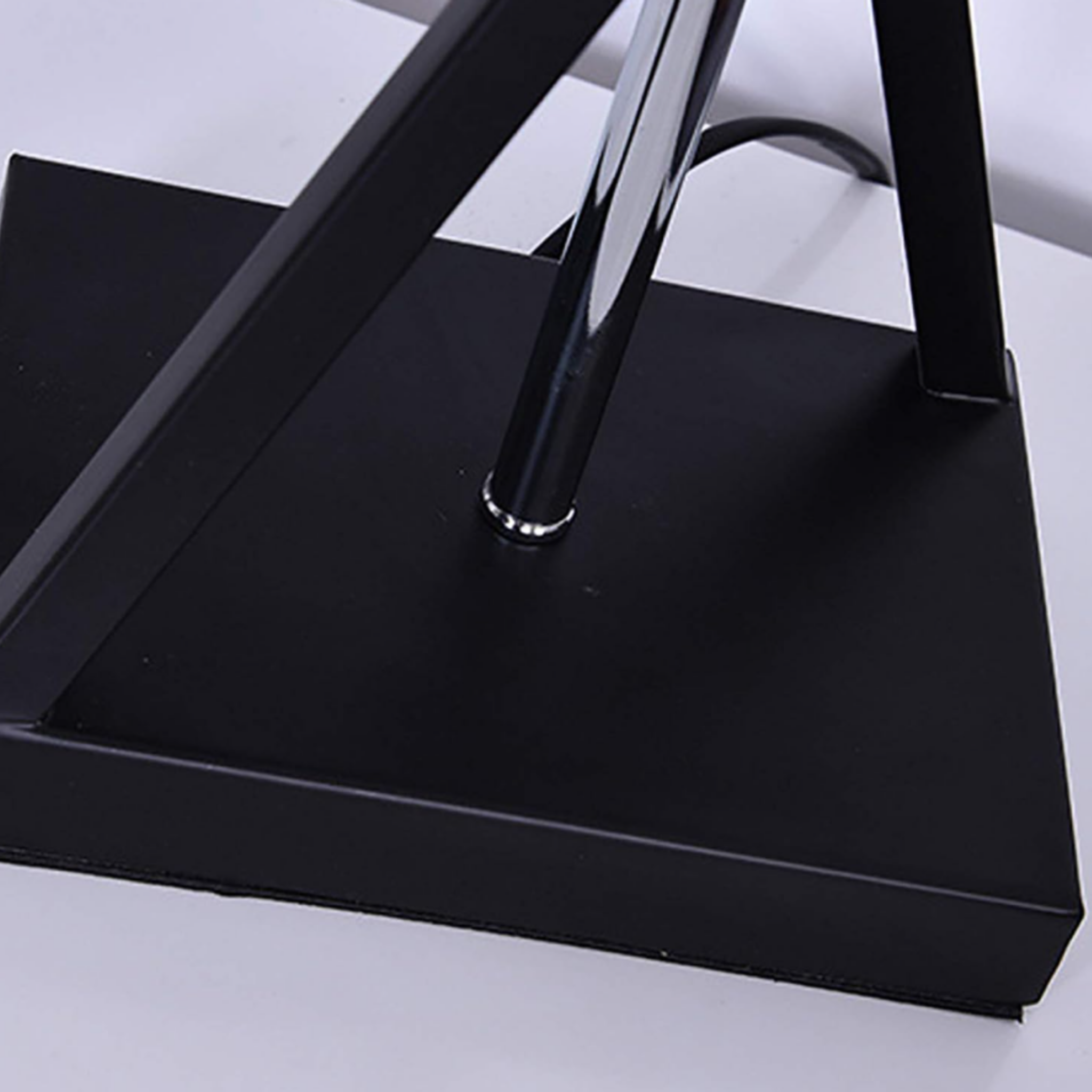 Close-up of the iron lamp base