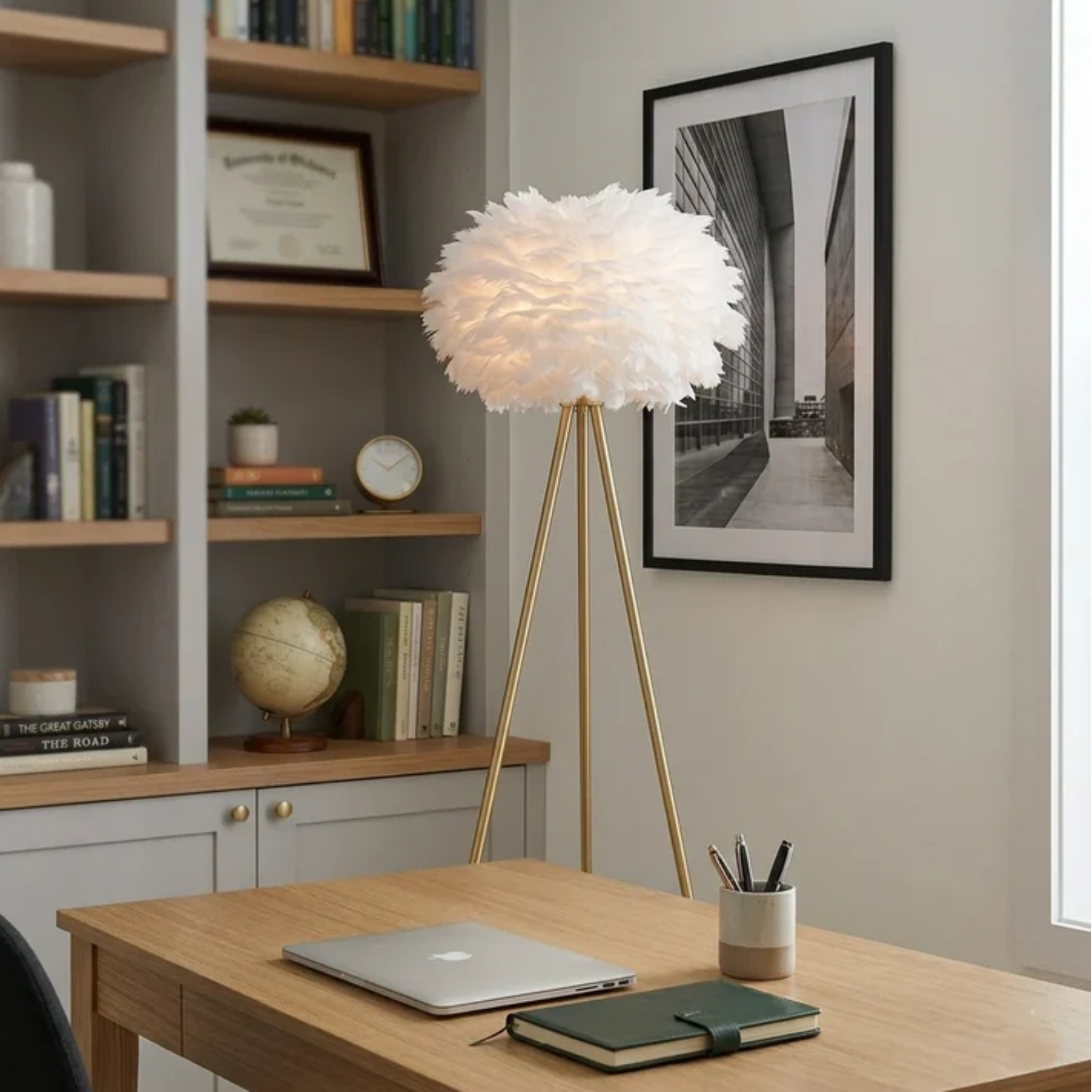 Modern feather globe floor lamp in a boutique-style interior