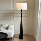 Modern fabric floor lamp in a bedroom interior