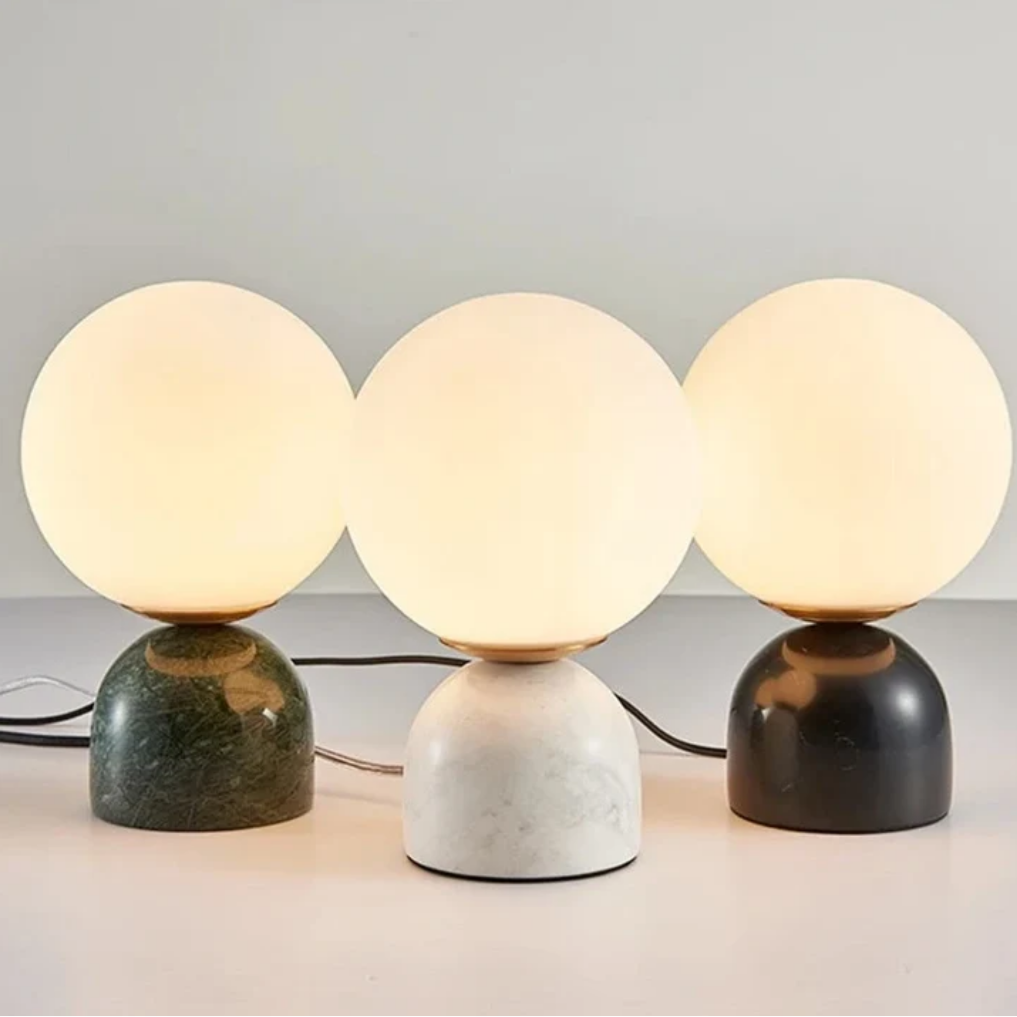 Modern glass ball table lamp available in white, black and green