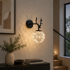 Modern glass globe wall light beside a staircase