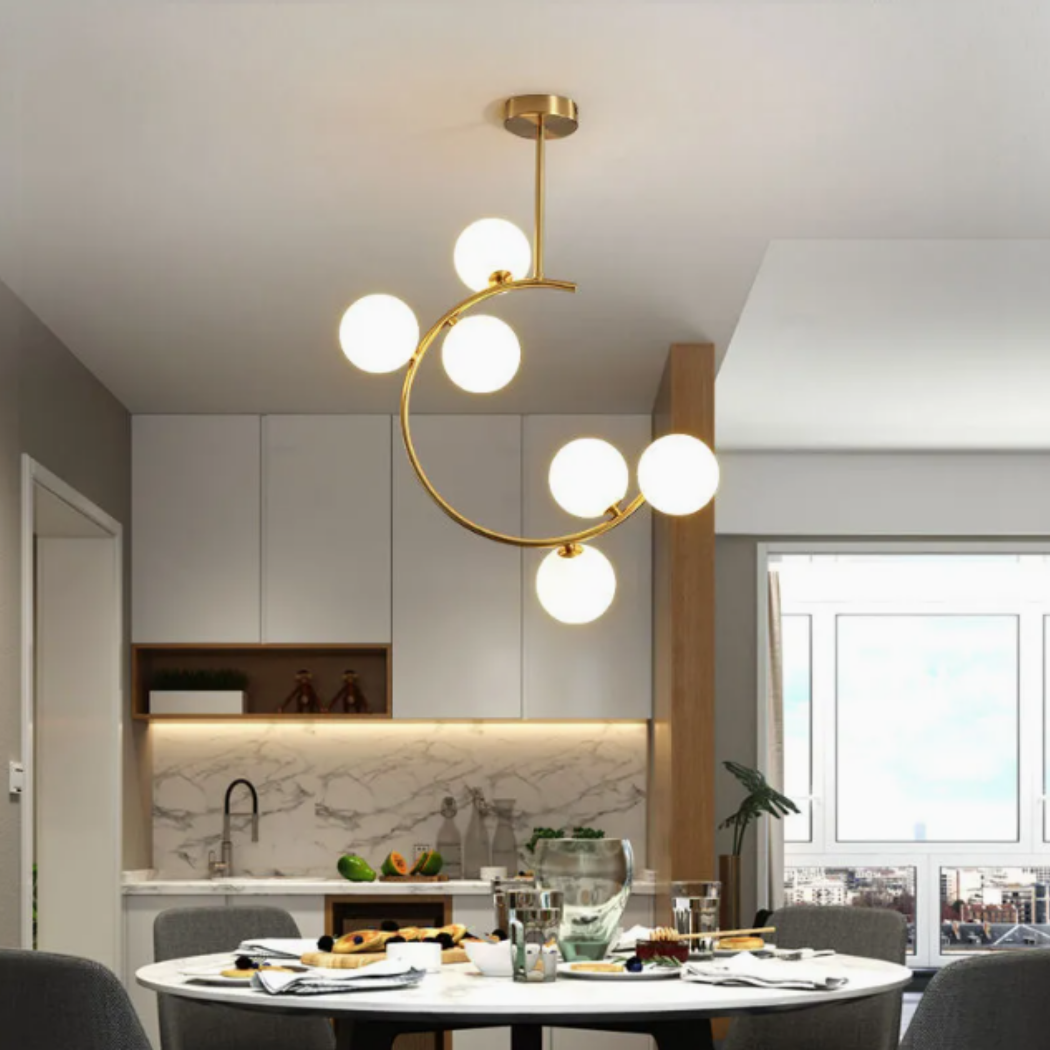 Modern gold glass globe chandelier above a dining table